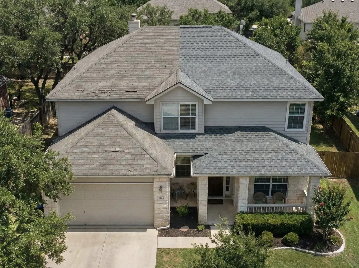 Before and after on a Stone Oak home in San Antonio: old shingles on the left, new on the right